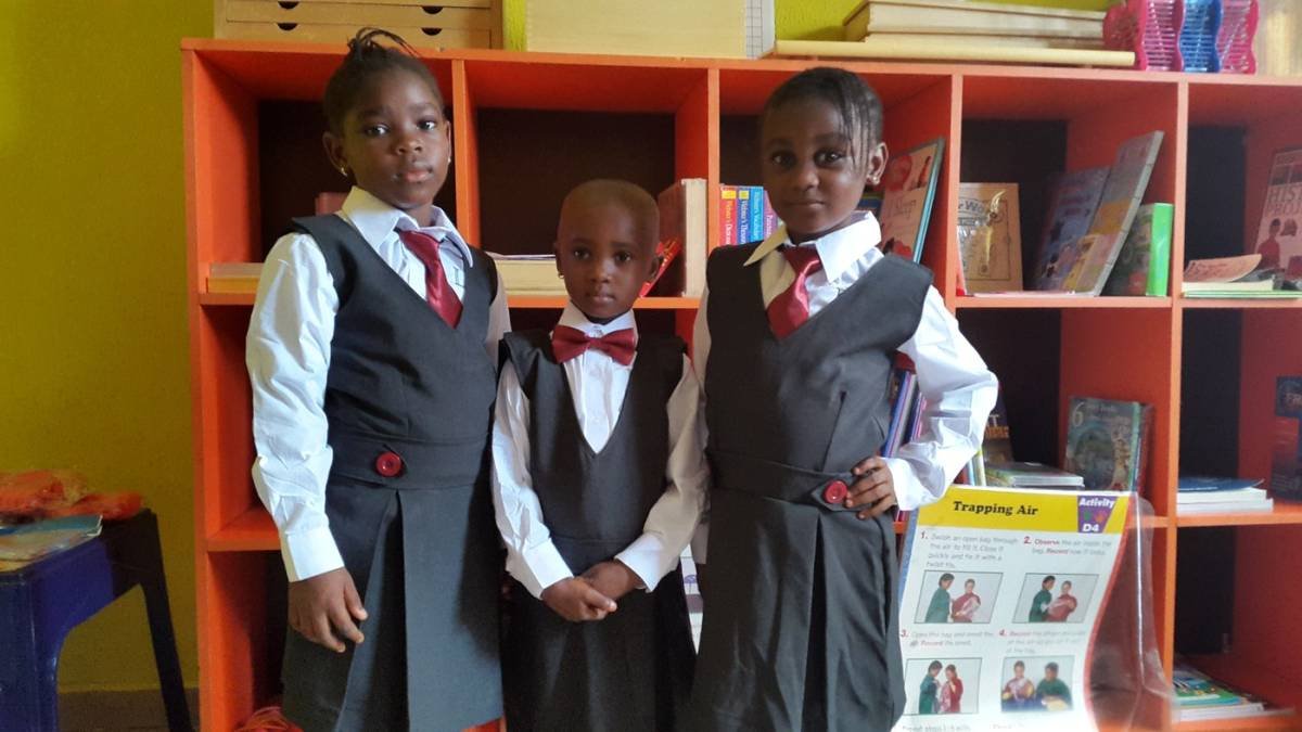 Lilydion scholars in front of the classroom learning center
